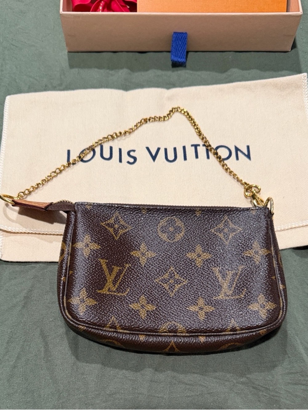 Louis Vuitton Monogram Mini Pochette in Brown with Gold Chain